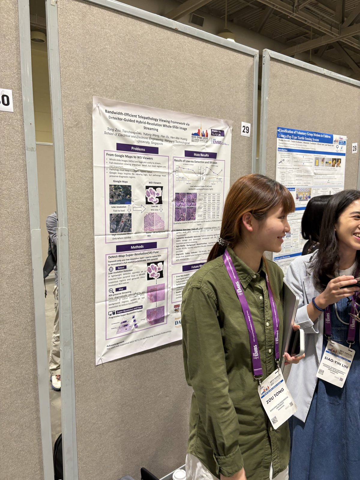 Tong Zou presenting her telepathology poster at IEEE EMBC 2026